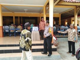 Babinkamtibmas hadiri penyerahan program PTSL